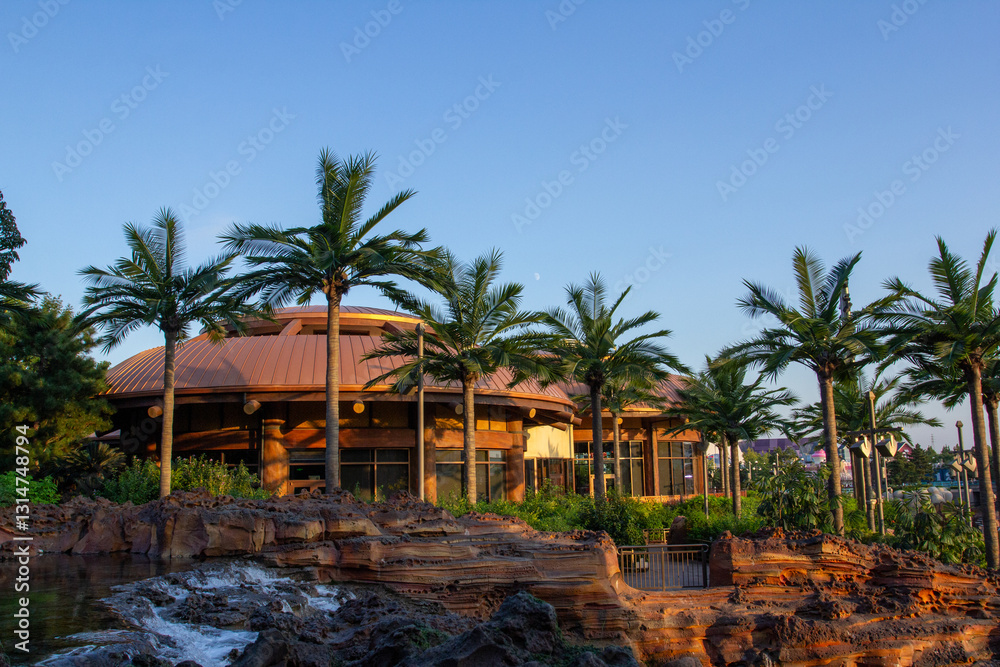 Fototapeta premium tropical beach with palm trees and blue sky