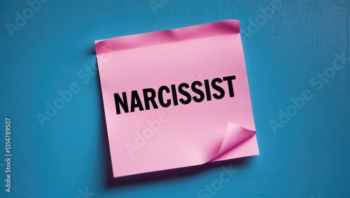 Pink note on a blue wall with the text NARCISSIST, a type of personality disorder characterized by self-centered individuals, inflated self-importance, a need for attention and admiration, and a la...