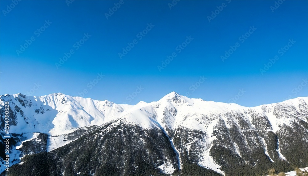 Photo of snowy mountain peaks with clear sky Photo of snowy mountain peaks with clear sky