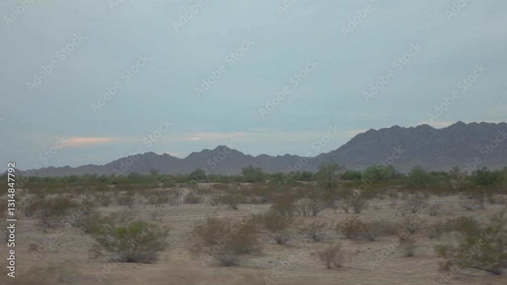 Desert highway with mountain backdrop in Arizona in slow motion 120fps Desert highway with mountain backdrop in Arizona in slow motion 120fps
