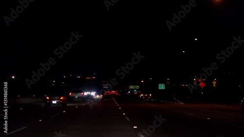 Driving at dusk on the road to Yuma, Arizona with vibrant sunset skies in slow motion 120fps