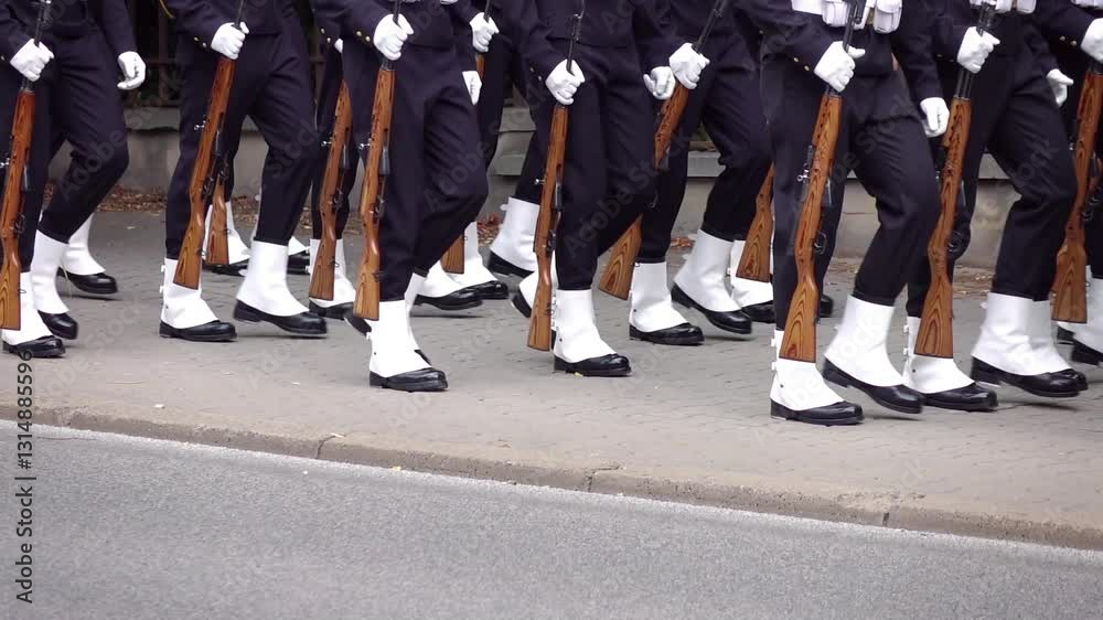 Navy soldiers marching on a sidewalk during a parade in slow motion 120fps Navy soldiers marching on a sidewalk during a parade in slow motion 120fps