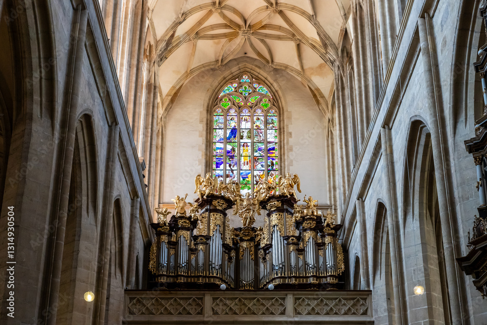 Obraz premium Large organ and large stained glass window in main hall in St Barbara Cathedral in Kutna Hora city in Czech Republic