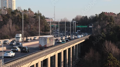 Stockholm, Sweden Traffic at sunset on the E4 highway photo