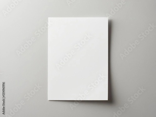 Blank white paper mockup on light gray background