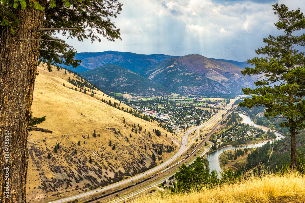 Aerial view of I90 highway and East Missoula, Montana as viewed from Sentinel mountain. Missoula is a city in and the county seat of Missoula County, Montana. It is located along the Clark Fork River.