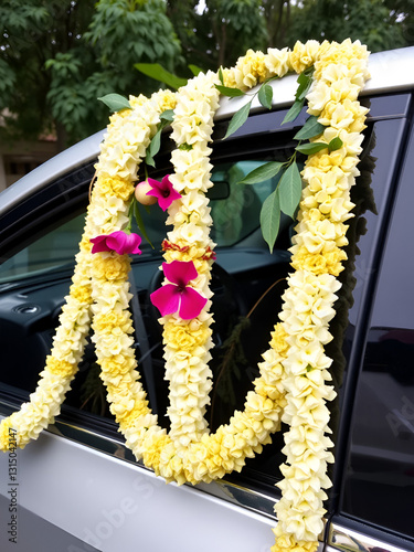 jasmine garland, mixed flower garland hanging on new vehicle to respect to amulet or Consummate, believe about driver car will safety