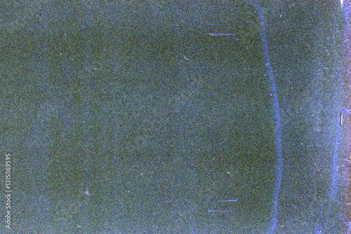 Fototapeta Naklejka Na Ścianę i Meble -  Blank grained film strip texture background with heavy grain, dust and light leak