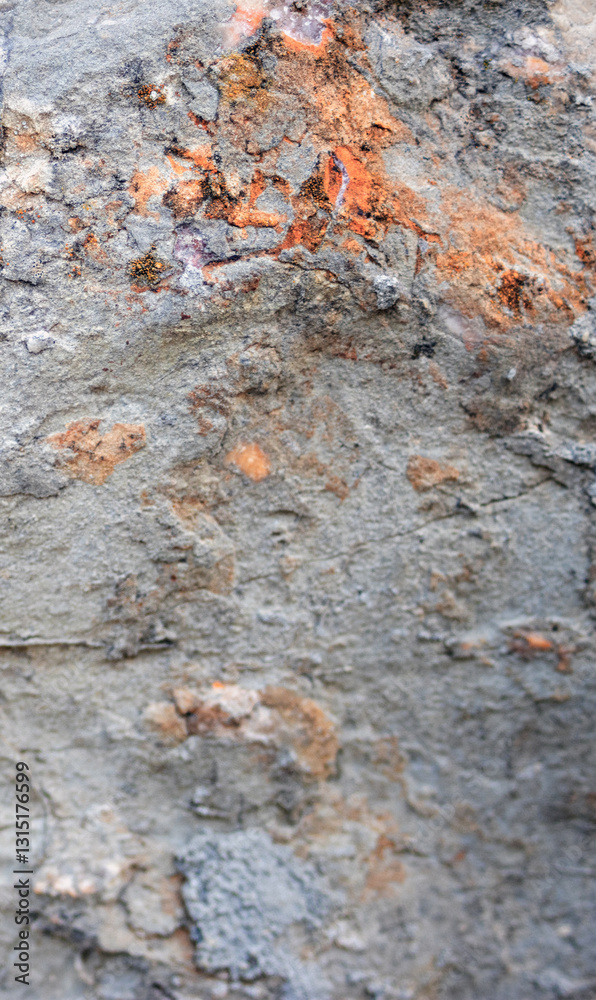 Rusty textured stone vertical abstract background..Closeup. For design.