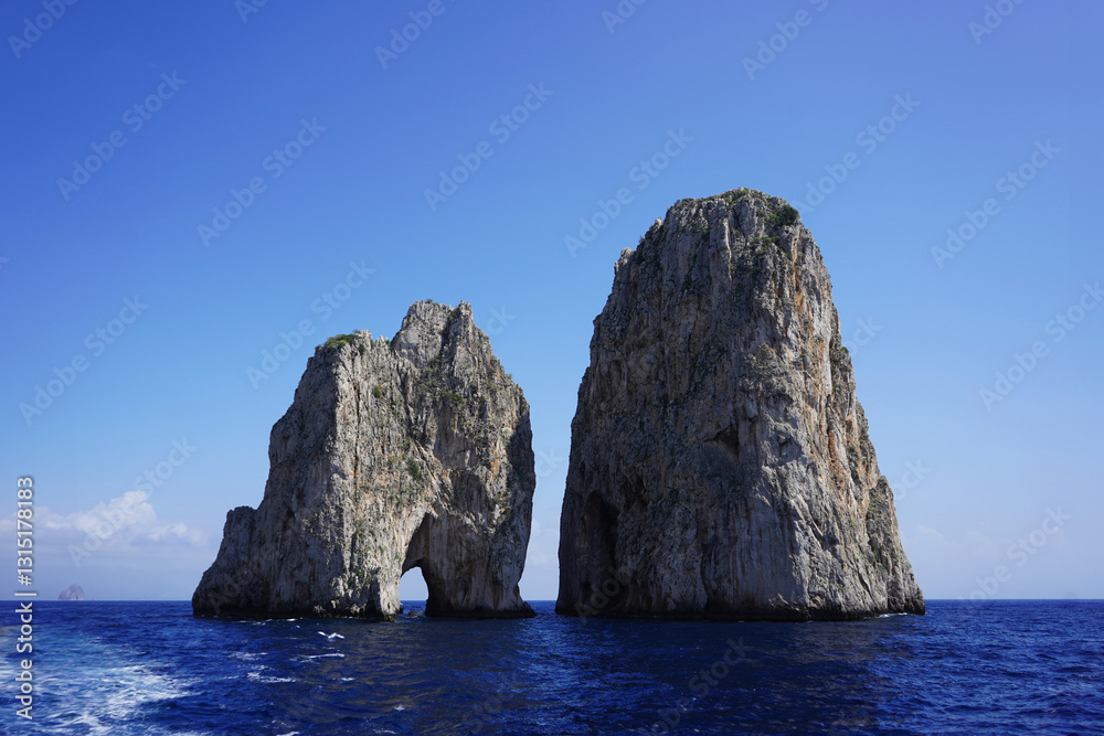 Scenic View of Capri Island, Italy – Rocky Coastline and Turquoise Waters Scenic View of Capri Island, Italy – Rocky Coastline and Turquoise Waters