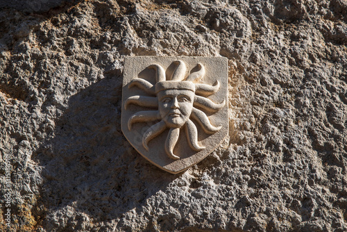 Принти на полотні Detail of a bas-relief on the wall of a house in the village of Châteauneuf in B