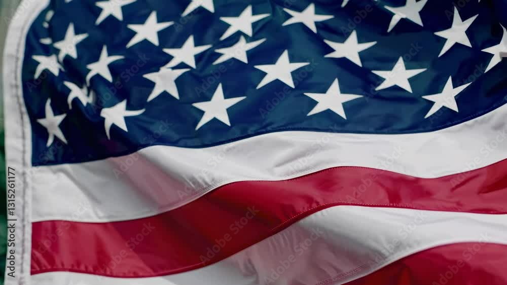 American flag waving in the wind during a sunny afternoon in a vibrant park American flag waving in the wind during a sunny afternoon in a vibrant park