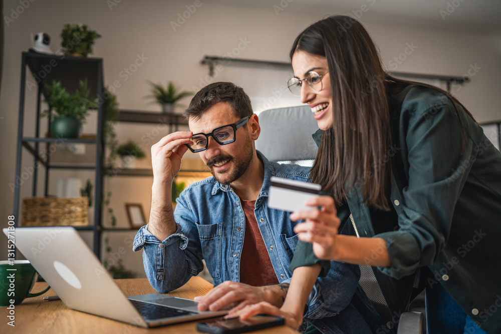 man and woman work from home and buy online on laptop and credit card man and woman work from home and buy online on laptop and credit card