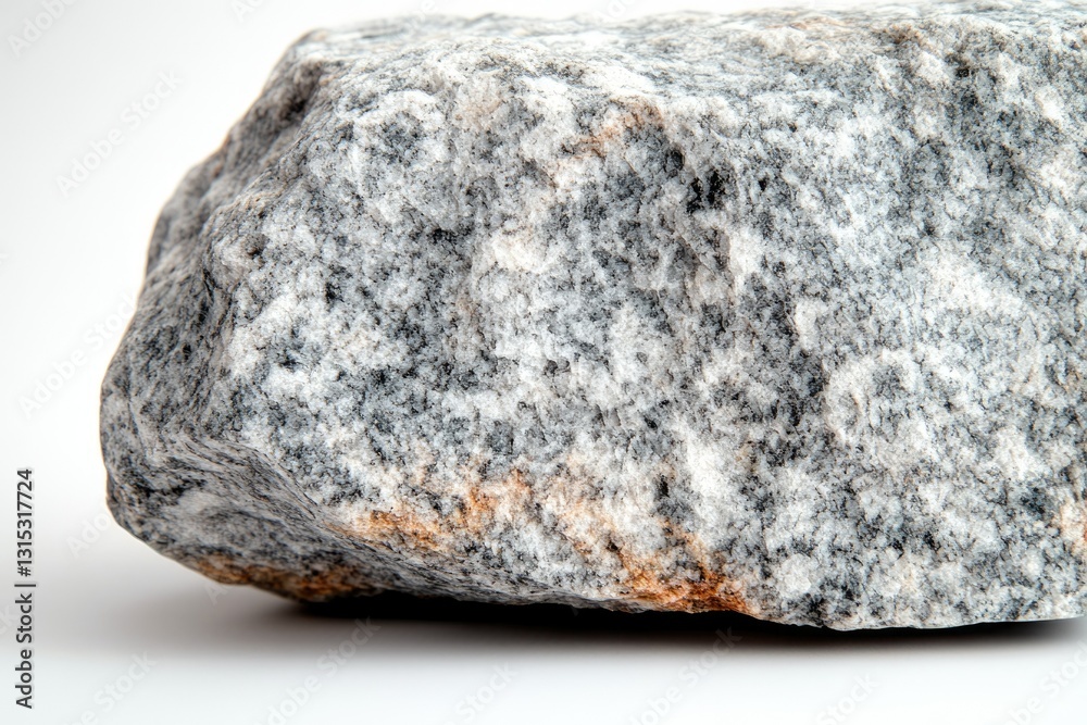 A close-up of a rough, gray rock with subtle orange veins, showcasing its coarse texture. A close-up of a rough, gray rock with subtle orange veins, showcasing its coarse texture.
