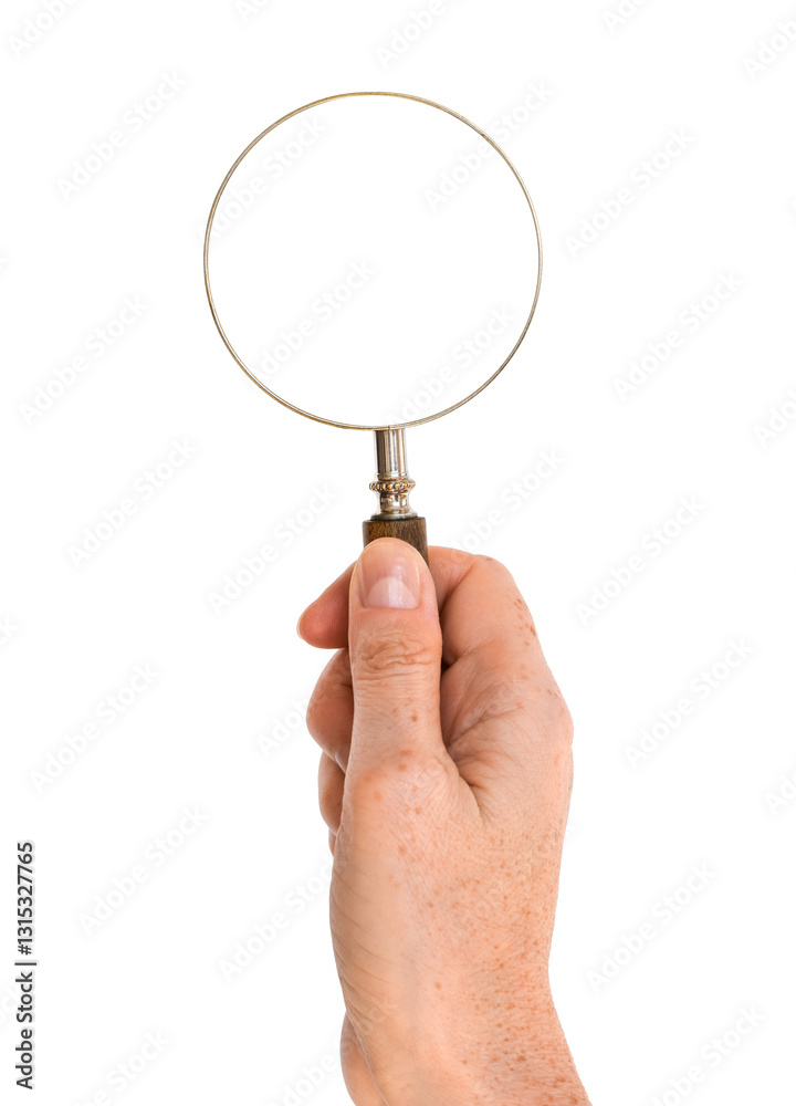 Person's hand holding magnifying glass Person's hand holding magnifying glass