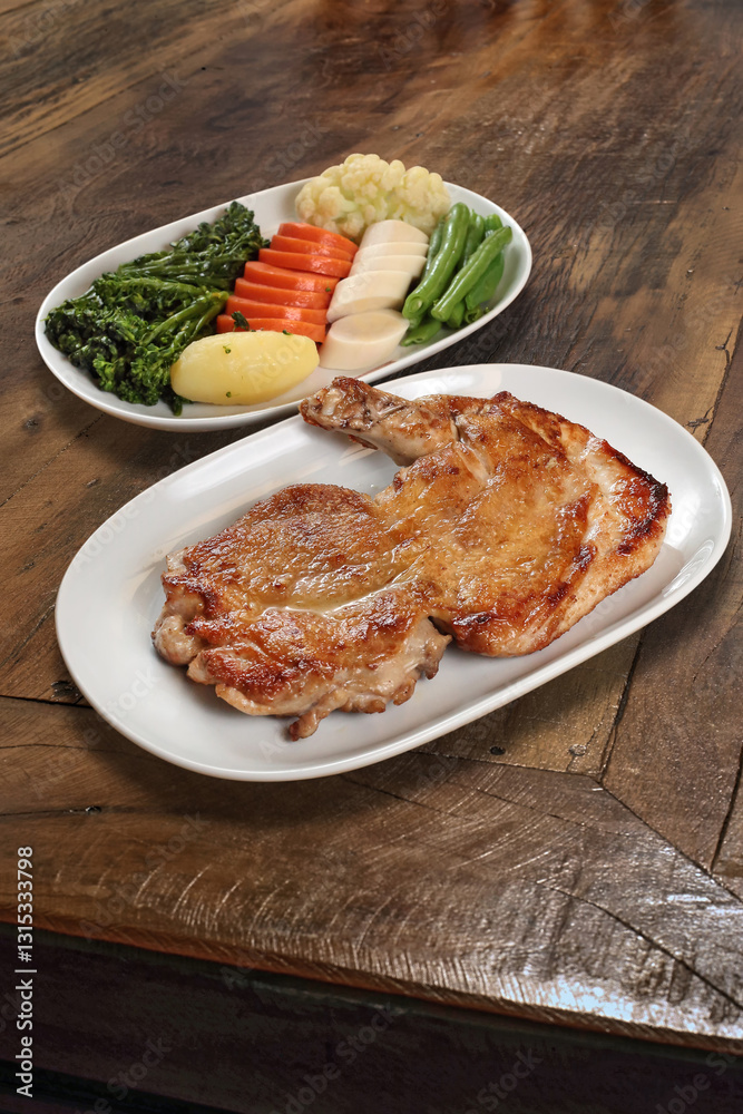 Grilled chicken with vegetables on plate Grilled chicken with vegetables on plate