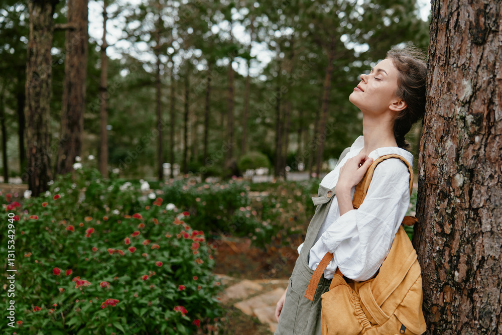 Young woman enjoying nature outdoors with a backpack, wearing casual clothing, set against a serene green forest background in warm tones Young woman enjoying nature outdoors with a backpack, wearing casual clothing, set against a serene green forest background in warm tones