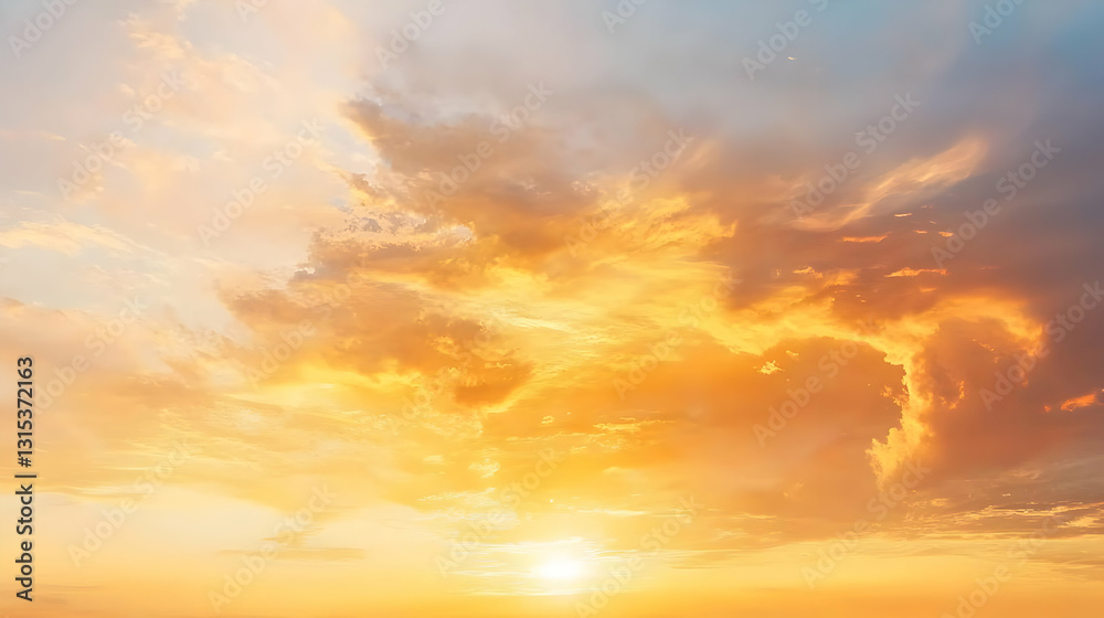 Obraz premium Golden Hour Sunset with Orange and Yellow Cloudscape and Sunlight