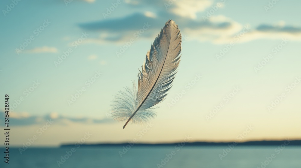 Single white feather floats gently against a serene sunset sky over calm ocean water. Single white feather floats gently against a serene sunset sky over calm ocean water.