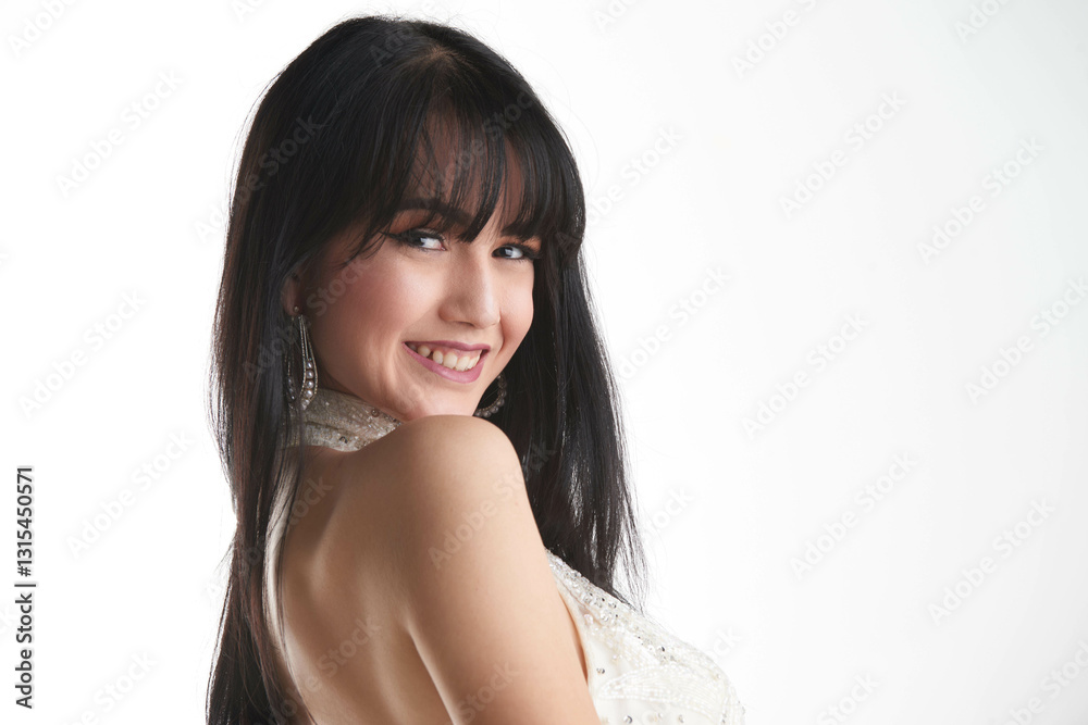 A photo of a beautiful brunette Caucasian Latina in an elegant white lounge dress, softly lit against a commercial white background. A photo of a beautiful brunette Caucasian Latina in an elegant white lounge dress, softly lit against a commercial white background.