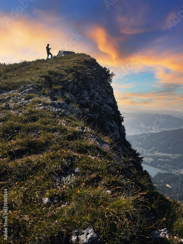 Hiker’s Triumph – Witnessing Twilight from Schafberg’s Summit