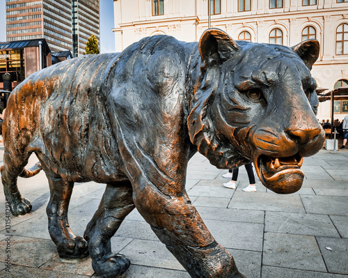 Oslo, Norway - August 7 2020: Bronze Tiger Statue near the Central Train Station of Oslo