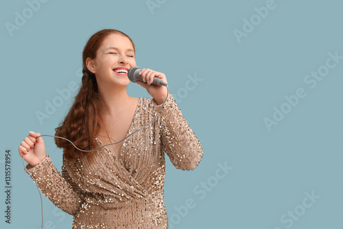 Beautiful young woman singi...
