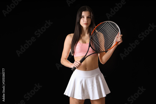 Sporty young woman with ten...