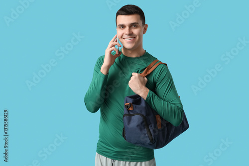 Young man with sports bag t...