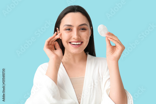 Happy young woman in bathro...