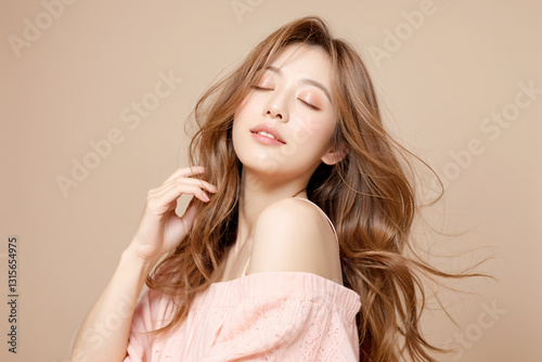 Woman touching her hair seeming satisfied, eyes closed, hair blowing softly in wind, AI generated