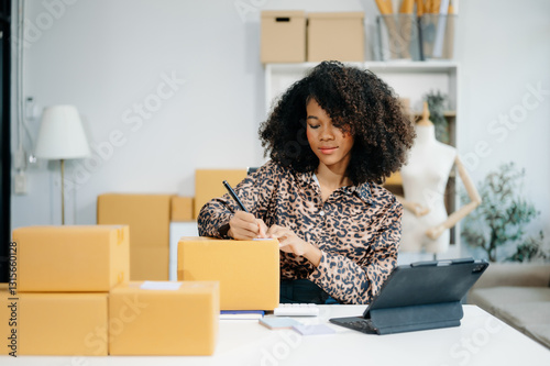 Small business entrepreneur SME freelance woman working at home office, BOX,tablet and laptop online, marketing, packaging