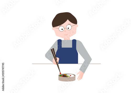 お弁当を詰める男性