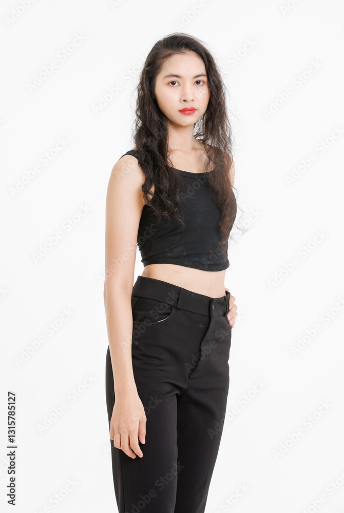 Portrait of asian beautiful woman with curly hair, wearing black tank top black long pants, model girl attractive confident cheerful standing smiling pose look at camera on white background in studio. Portrait of asian beautiful woman with curly hair, wearing black tank top black long pants, model girl attractive confident cheerful standing smiling pose look at camera on white background in studio.