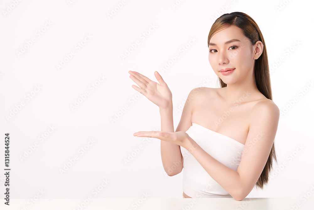 A beautiful young Asian woman with clean, fresh skin against a white background. She represents beauty, skincare, and spa treatments. A beautiful young Asian woman with clean, fresh skin against a white background. She represents beauty, skincare, and spa treatments.