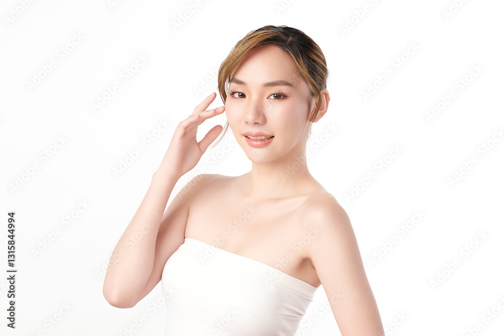 A beautiful young Asian woman with clean, fresh skin against a white background. She represents beauty, skincare, and spa treatments. A beautiful young Asian woman with clean, fresh skin against a white background. She represents beauty, skincare, and spa treatments.