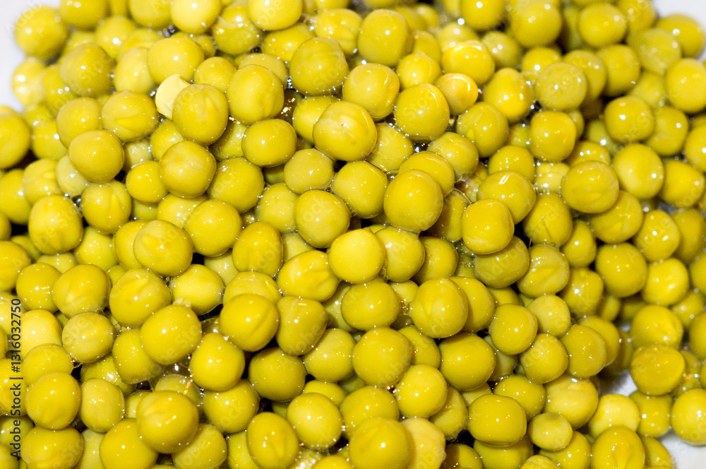 on the photo is a modern background of canned green peas on the photo is a modern background of canned green peas