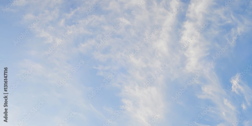 Fototapeta premium Peaceful Sky with Wispy Clouds