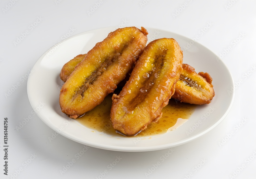 Fried Plantain on Plate with Syrup Delicious Dessert or Snack Fried Plantain on Plate with Syrup Delicious Dessert or Snack
