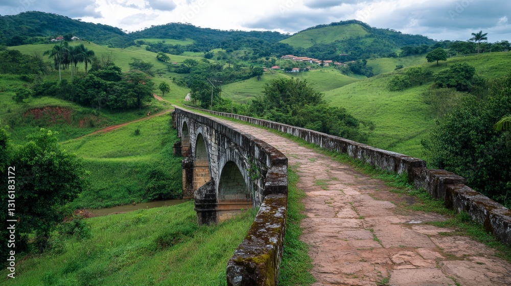 Scenic stone bridge over river in lush green valley landscape Scenic stone bridge over river in lush green valley landscape