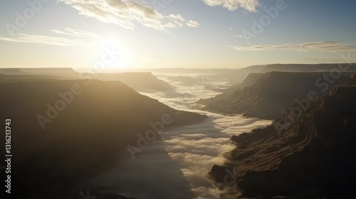 Sunrise over a Canyon Valley shrouded in Mist