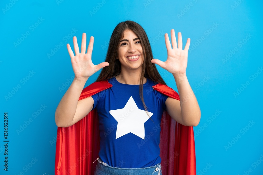 Super Hero caucasian woman isolated on blue background counting ten with fingers Super Hero caucasian woman isolated on blue background counting ten with fingers