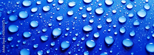 Dew drops on a blue background. Abstract wet texture, background material of scattered pure water drops