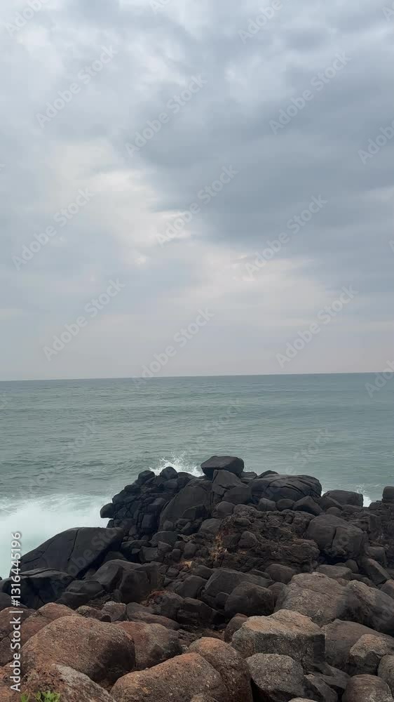 Waves Crashing Against Rocks at the Shore. Powerful Ocean Scene, Sri Lanka
Waves Crashing Against Rocks at the Shore. Powerful Ocean Scene, Sri Lanka