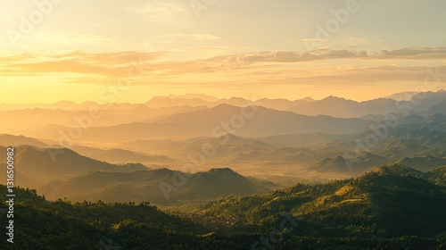 Misty mountains at sunrise, layered landscape with a warm golden light