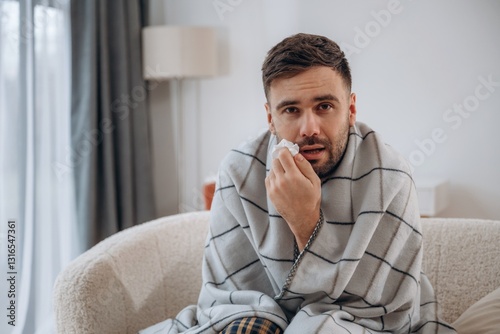 Cold, illness. Sick man is feeling bad at home