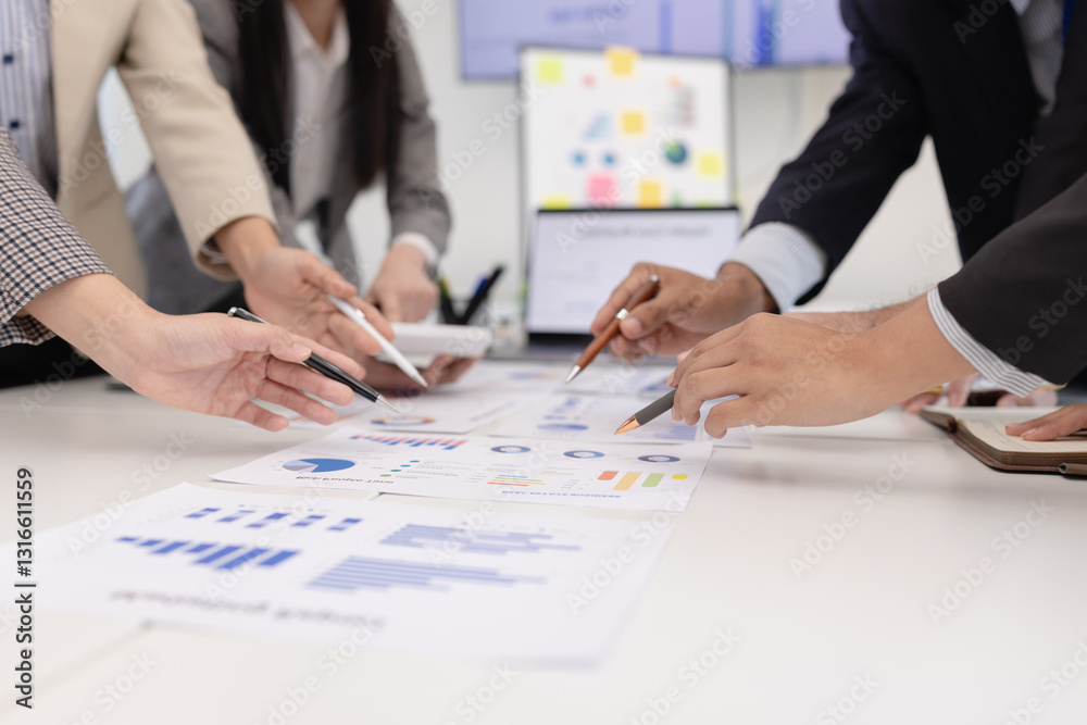 Group of business people working together with marketing strategy analysis at meeting room, Business technology in boardroom for training marketing concept. Group of business people working together with marketing strategy analysis at meeting room, Business technology in boardroom for training marketing concept.