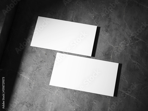 A clean business card placed on a textured stone surface, featuring sharp, well-defined shadows, perfect for a sophisticated brand look.
