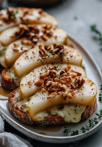 Delicious Pear and Cheese Toast With Nuts Served on a White Plate With Fresh ...