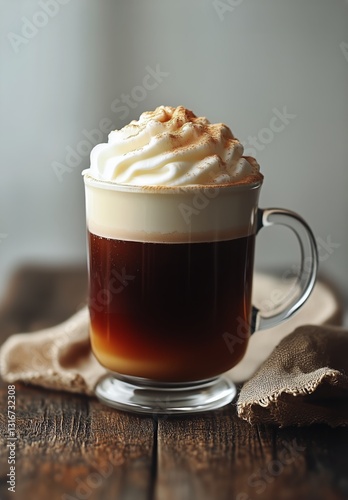 Coffee Drink Topped With Whipped Cream Served in a Glass on a Wooden Surface